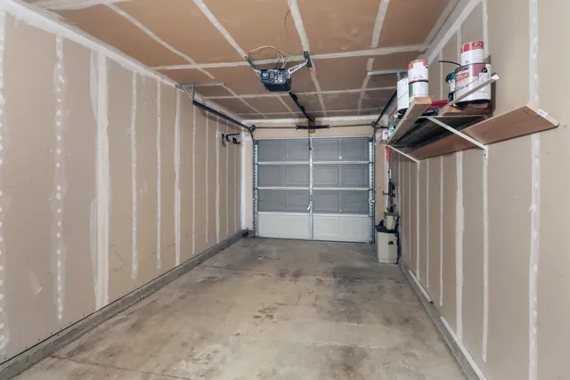 a bunch of flowers are in front of a house