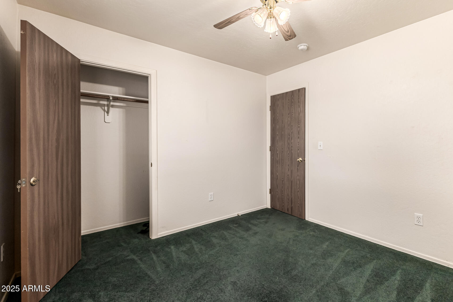 1008 North Meridian Drive Apache Junction, AZ 85120 - Photo 24 of 38 an empty room with a bathroom