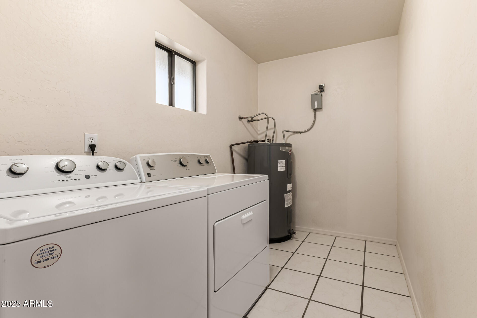 1008 North Meridian Drive Apache Junction, AZ 85120 - Photo 26 of 38 a utility room with dryer and washer