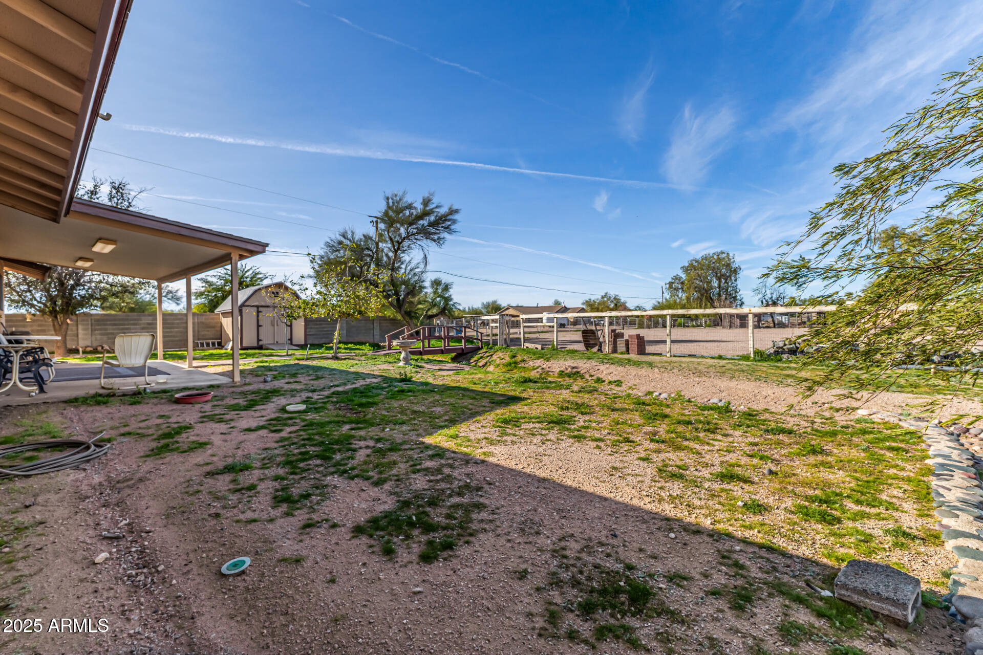1008 North Meridian Drive Apache Junction, AZ 85120 - Photo 33 of 38 a view of a yard with an outdoor space