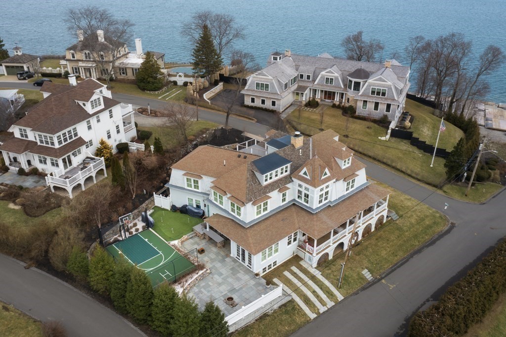 2 Merrill Street Hingham, MA 02043 - Photo 1 of 34 an aerial view of multiple houses with yard