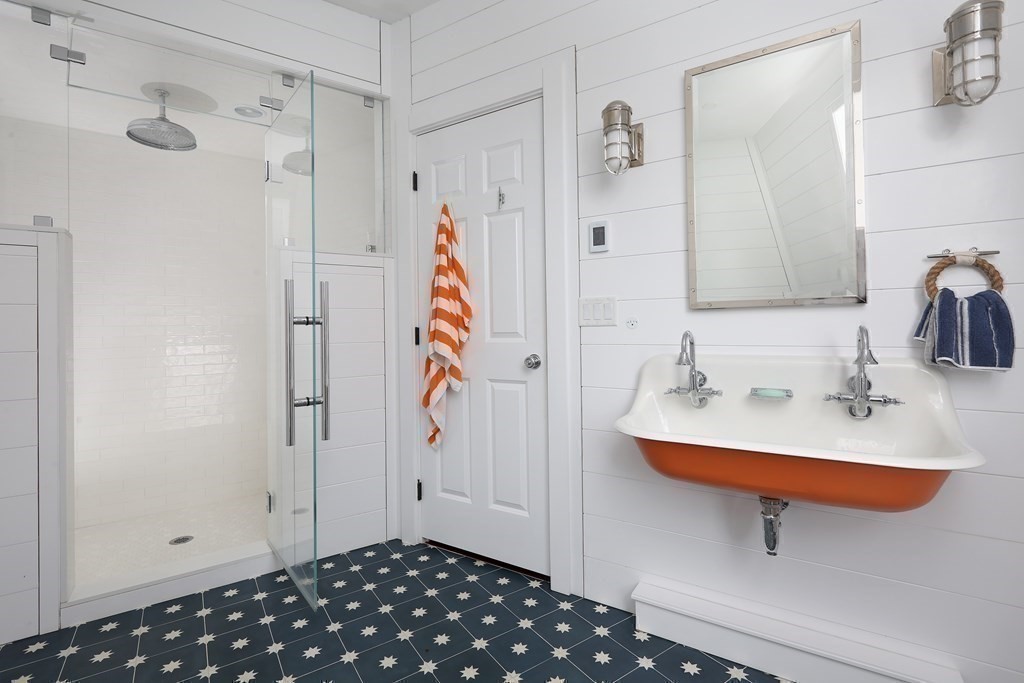 2 Merrill Street Hingham, MA 02043 - Photo 17 of 34 a bathroom with a sink and a shower