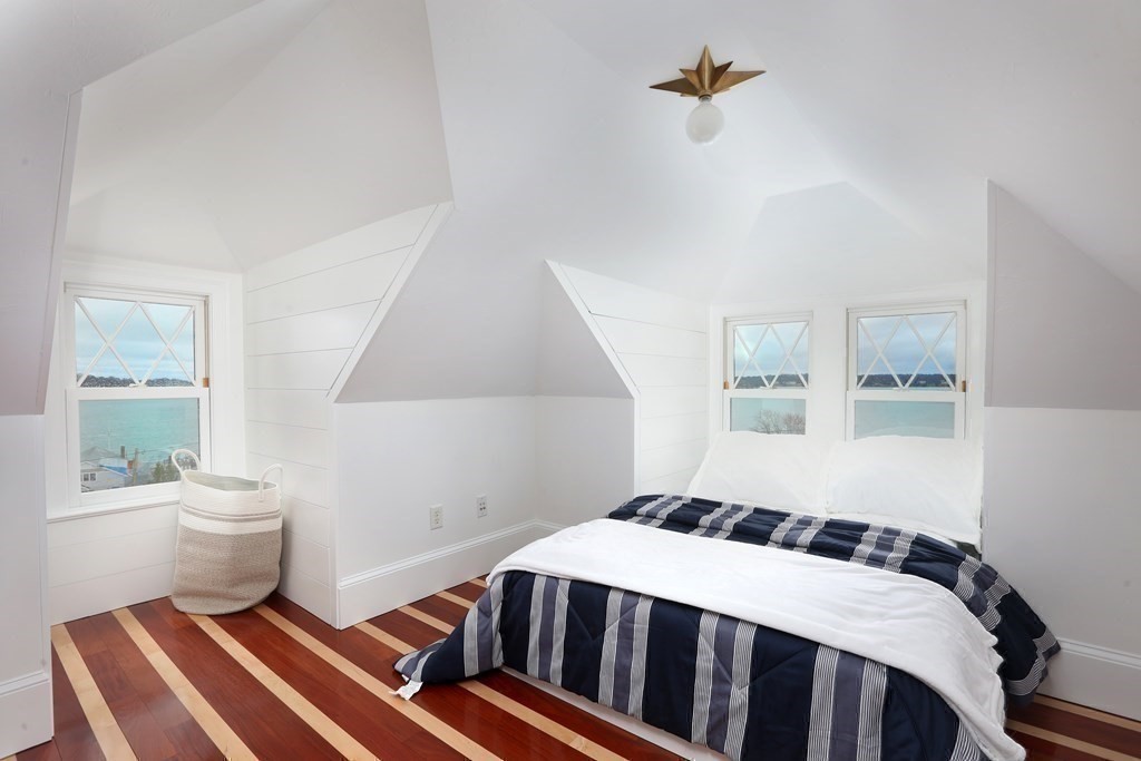 2 Merrill Street Hingham, MA 02043 - Photo 23 of 34 a bedroom with a bed and a window