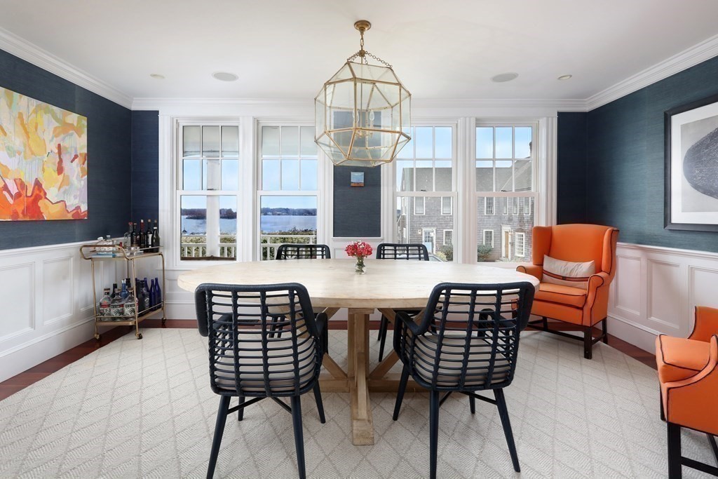 2 Merrill Street Hingham, MA 02043 - Photo 10 of 34 a dining room with furniture a chandelier and window