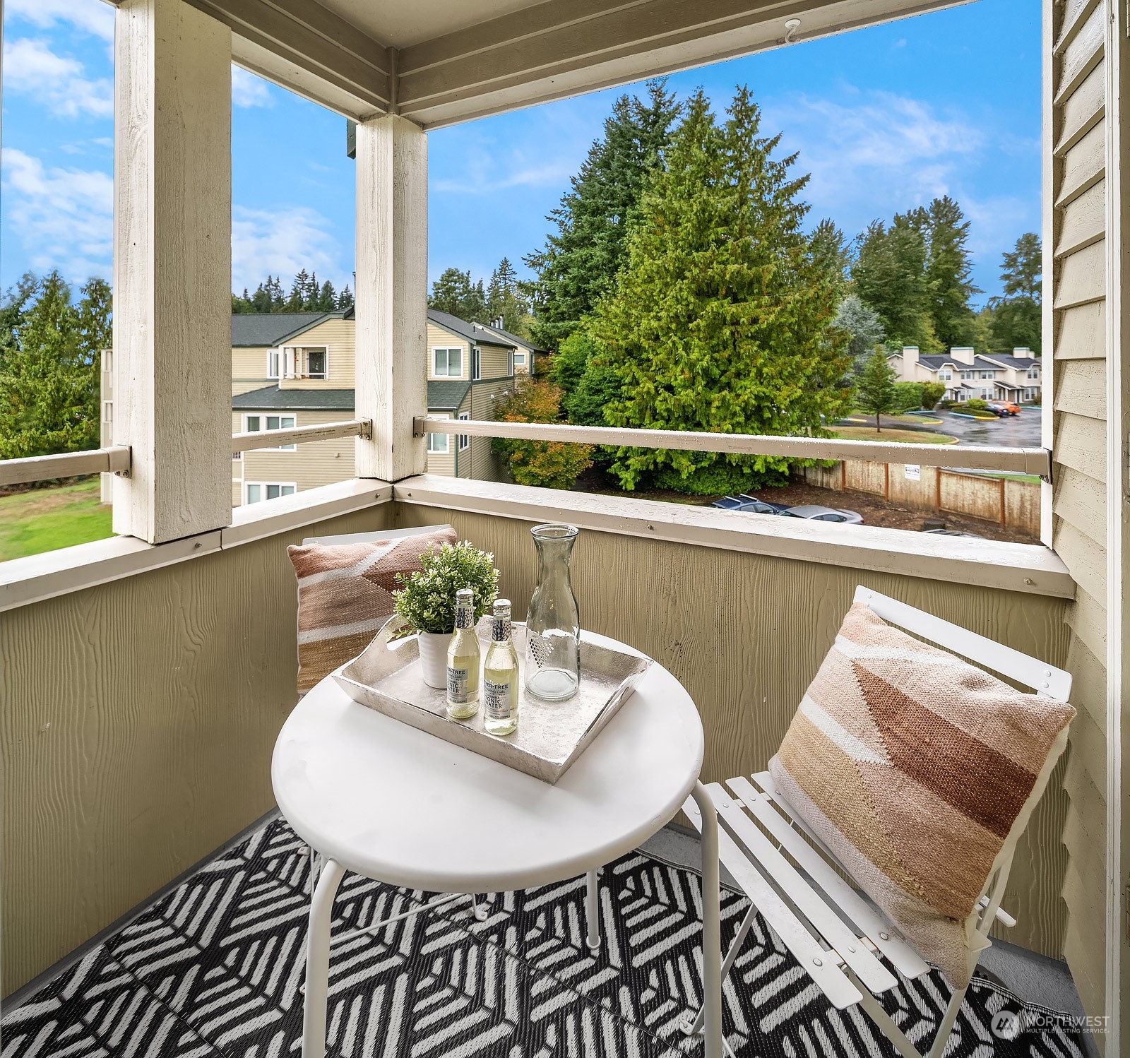 20324 Bothell Everett Highway, Unit F 301 Bothell, WA 98012 - Photo 12 of 28 a view of a dining room with furniture window and outside view