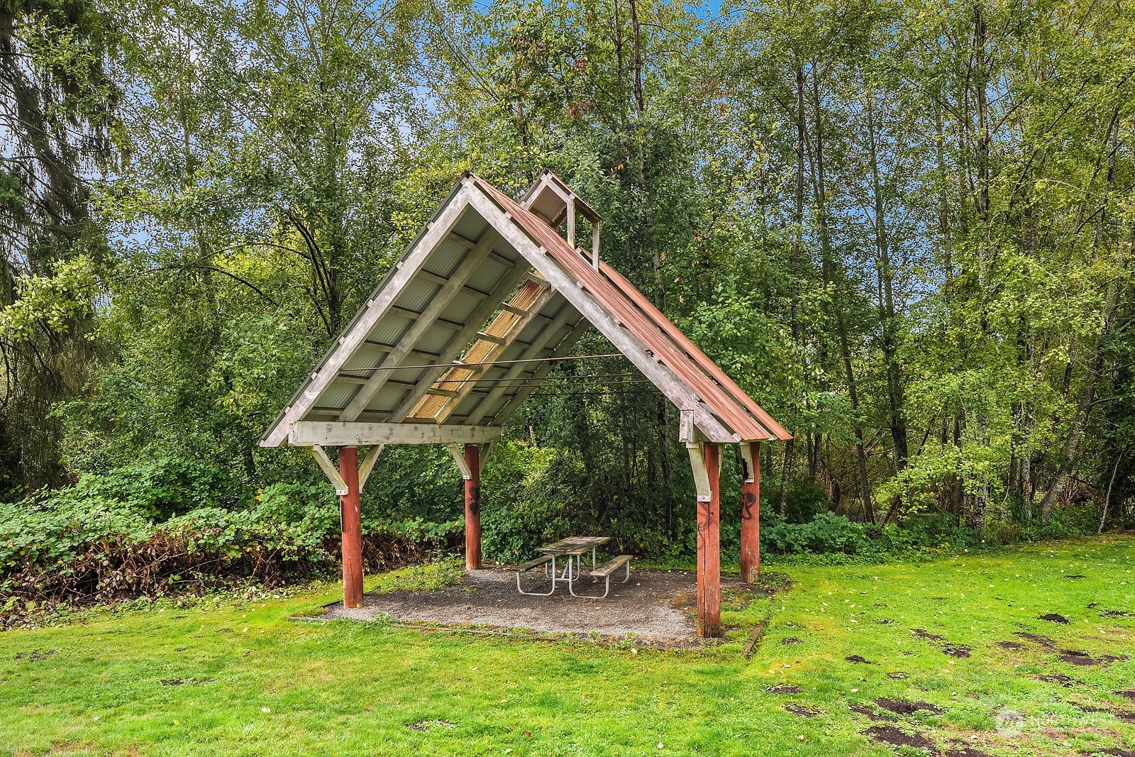 20324 Bothell Everett Highway, Unit F 301 Bothell, WA 98012 - Photo 28 of 28 a view of a chair and table in the garden