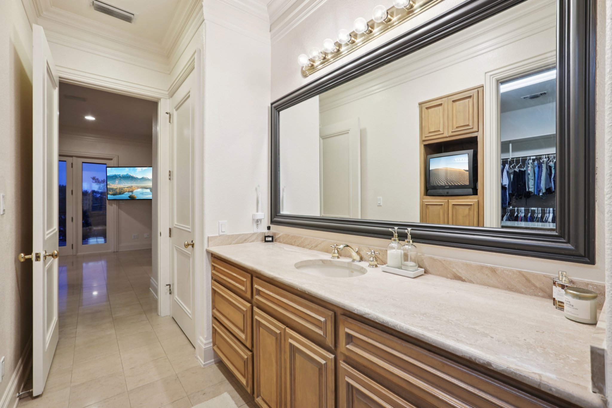 14701 Hornsby Hill Road Austin, TX 78734 - Photo 25 of 40 a bathroom with a sink and a mirror