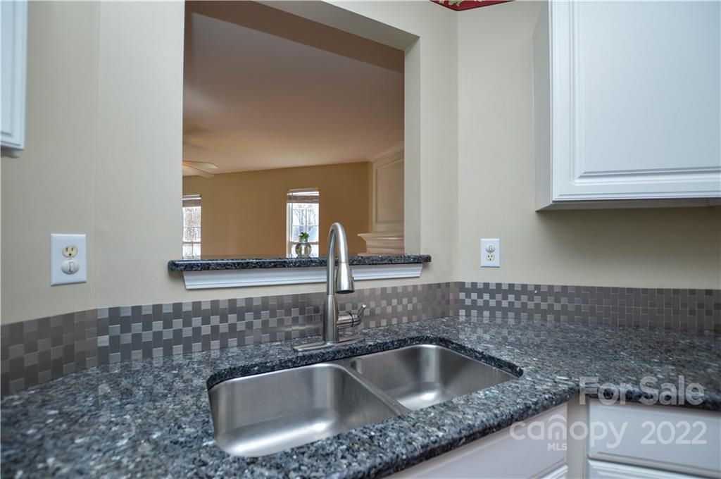 7608 Henderson Park Road Huntersville, NC 28078 - Photo 16 of 39 a close view of sink and tap