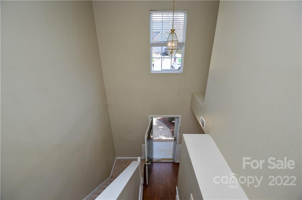 7608 Henderson Park Road Huntersville, NC 28078 - Photo 18 of 39 a bathroom with a toilet and a window