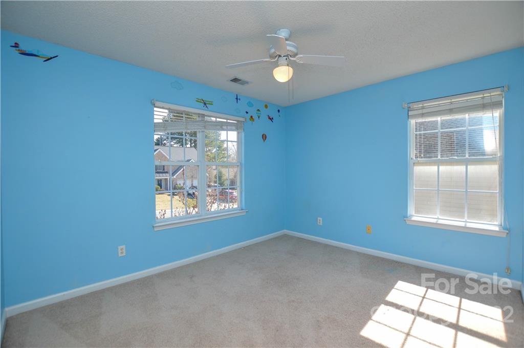 7608 Henderson Park Road Huntersville, NC 28078 - Photo 19 of 39 an empty room with a window