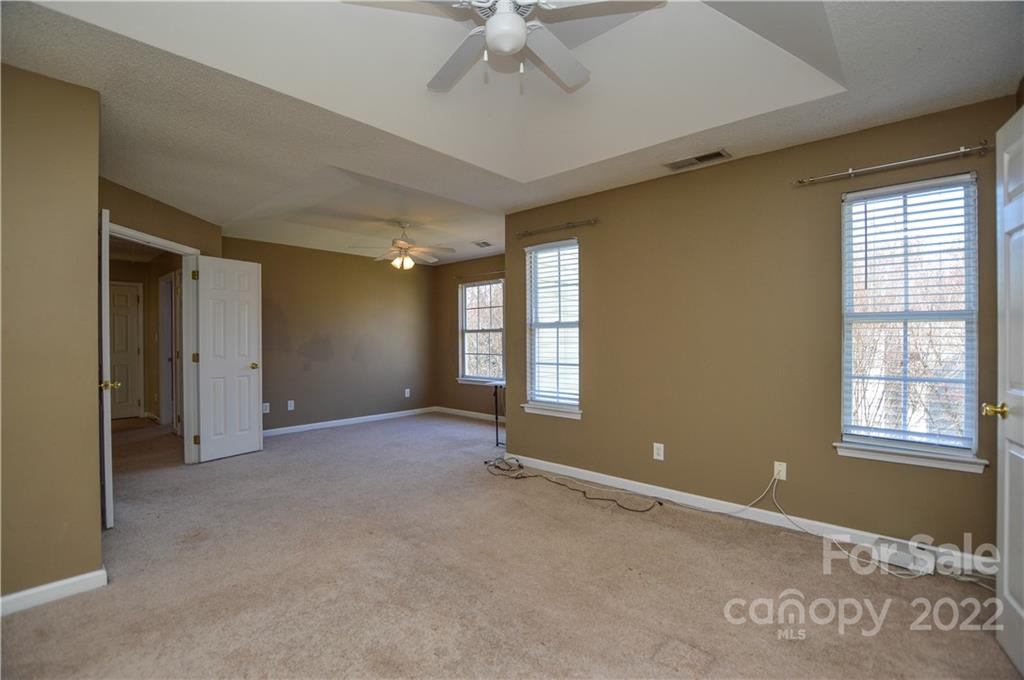 7608 Henderson Park Road Huntersville, NC 28078 - Photo 26 of 39 a view of an empty room with a window
