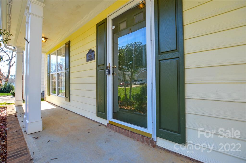 7608 Henderson Park Road Huntersville, NC 28078 - Photo 3 of 39 a view of a glass door of the house