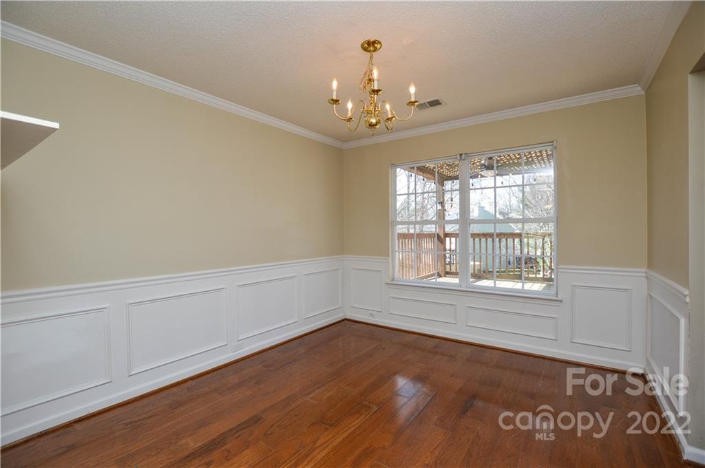 7608 Henderson Park Road Huntersville, NC 28078 - Photo 9 of 39 a view of an empty room with a window