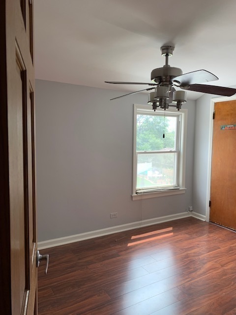 2247 South 3rd Avenue North Riverside, IL 60546 - Photo 10 of 19 an empty room with wooden floor chandelier and windows