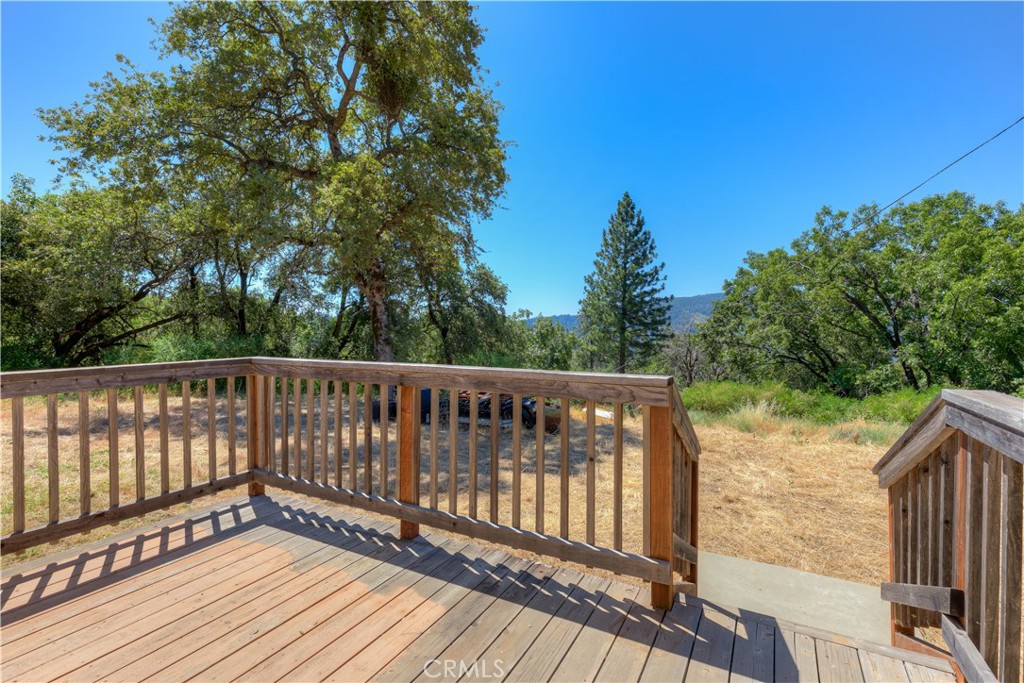 13545 Surcease Mine Road Oroville, CA 95965 - Photo 13 of 28 a view of deck with wooden floor and outdoor space