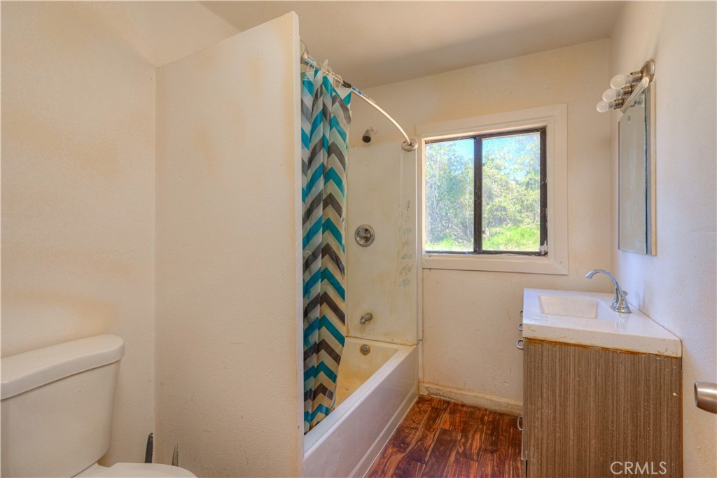 13545 Surcease Mine Road Oroville, CA 95965 - Photo 24 of 28 a bathroom with a sink and a bathtub