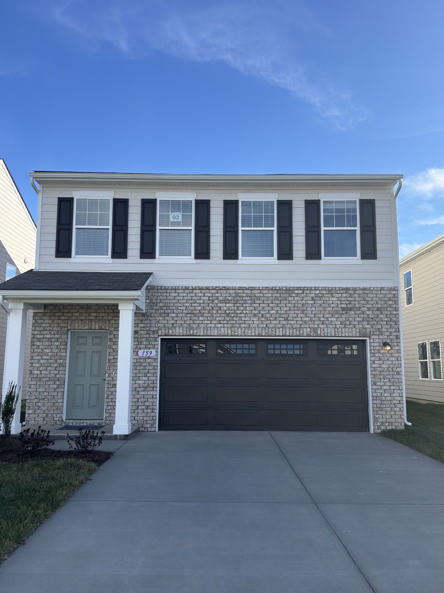 159 Snowdrop Avenue La Vergne, TN 37086 - Photo 1 of 16 a front view of a house with yard