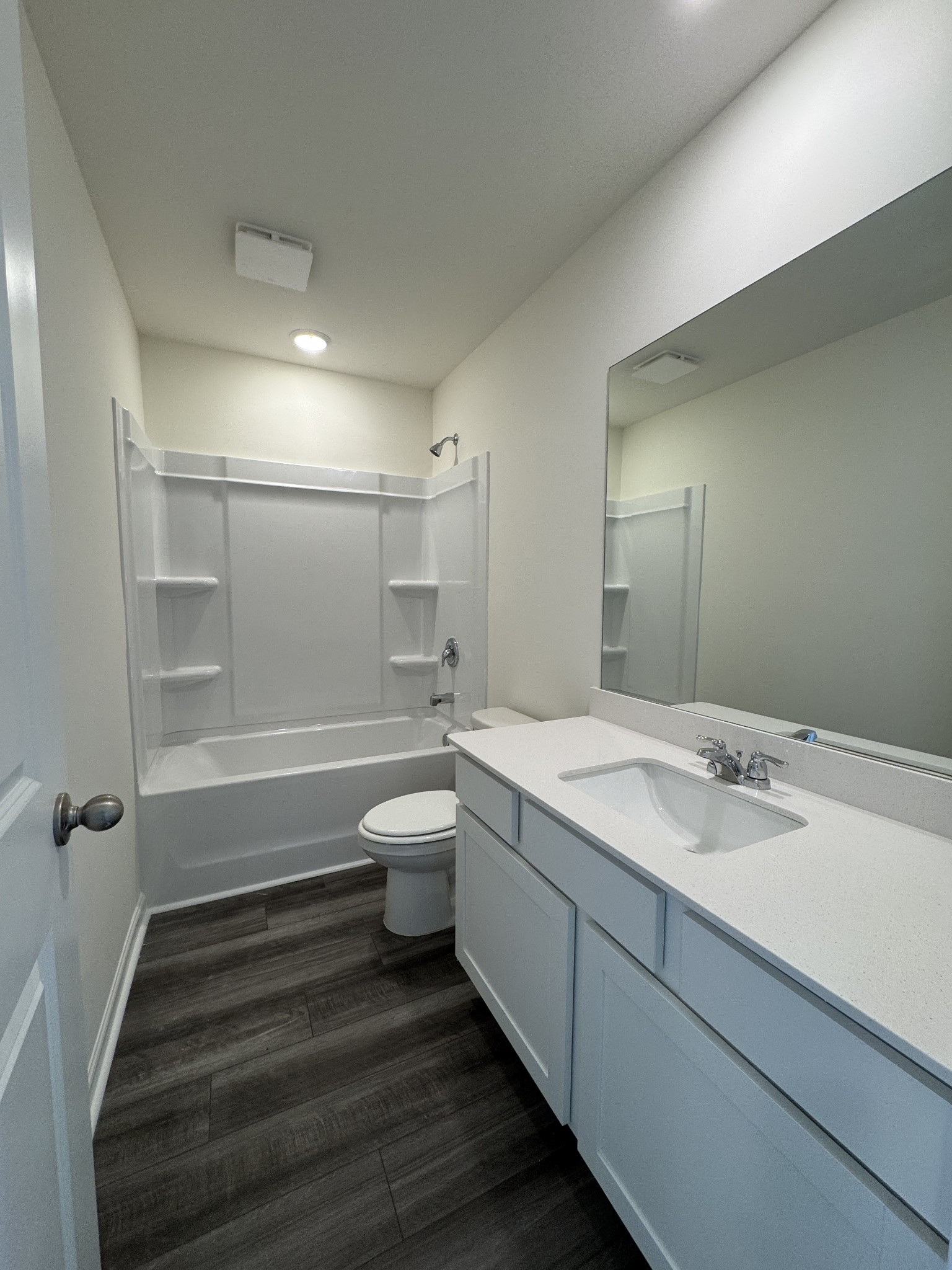 159 Snowdrop Avenue La Vergne, TN 37086 - Photo 5 of 16 a bathroom with a granite countertop sink mirror vanity and toilet