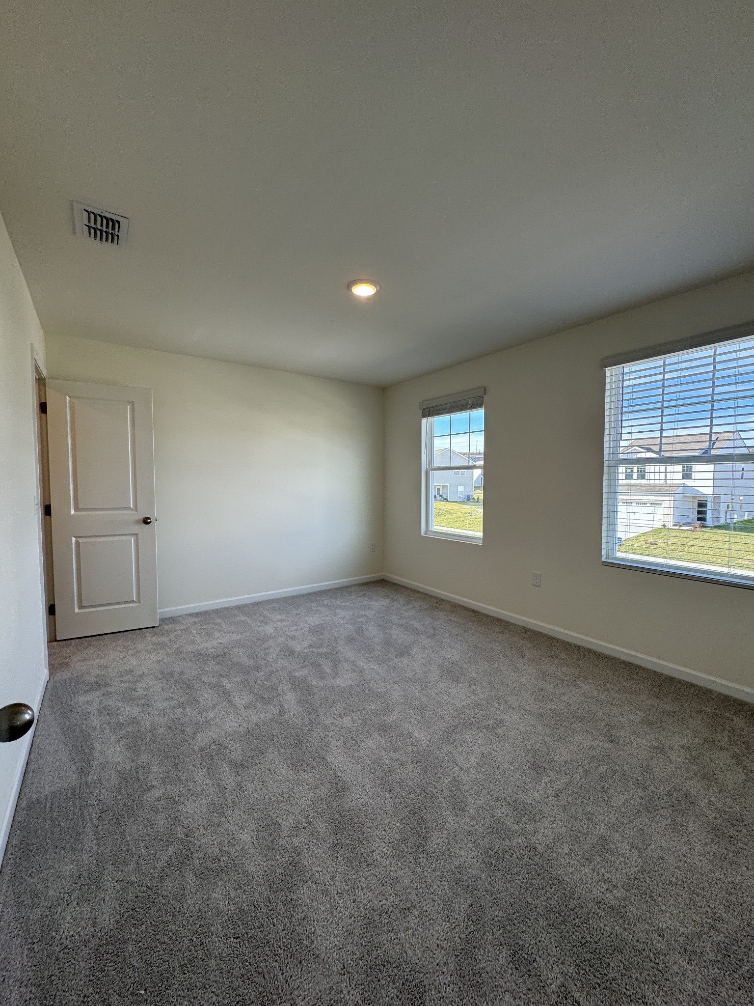 159 Snowdrop Avenue La Vergne, TN 37086 - Photo 7 of 16 a view of an empty room with a window