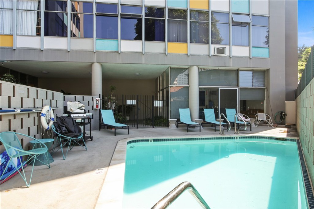 100 Atlantic Avenue, Unit 609 Long Beach, CA 90802 - Photo 2 of 10 a view of a house with a swimming pool and sitting area
