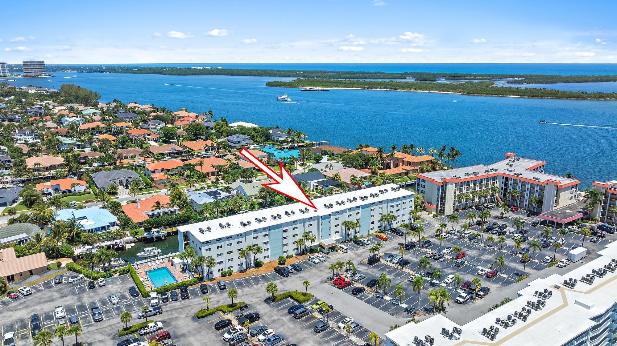 109 Paradise Harbour Boulevard, Unit 307 North Palm Beach, FL 33408 - Photo 16 of 20 a view of a balcony with an ocean view