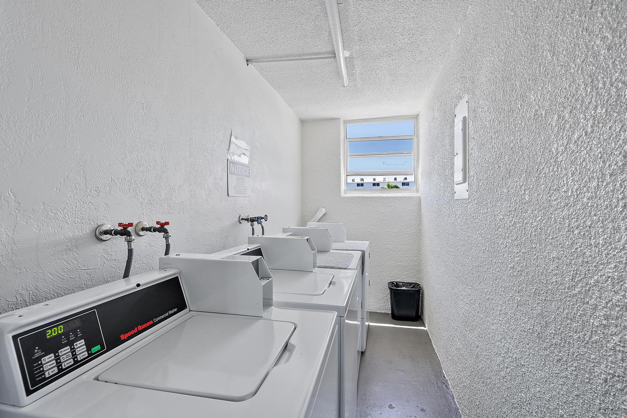 109 Paradise Harbour Boulevard, Unit 307 North Palm Beach, FL 33408 - Photo 20 of 20 a very nice looking room with a couch