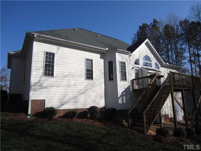 11700 John Allen Road Raleigh, NC 27614 - Photo 21 of 22 a front view of a house with a yard