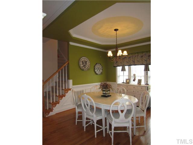 11700 John Allen Road Raleigh, NC 27614 - Photo 4 of 22 a view of a dining room with furniture and wooden floor