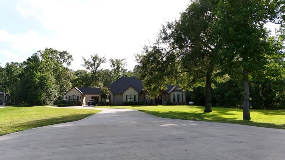 0 Riverview Crossing Huffman, TX 77336 - Photo 7 of 11 a view of swimming pool with a small yard