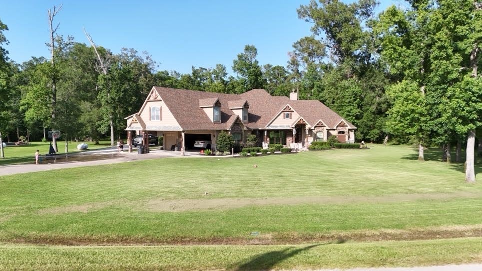 0 Riverview Crossing Huffman, TX 77336 - Photo 8 of 11 a aerial view of a house with swimming pool and big yard