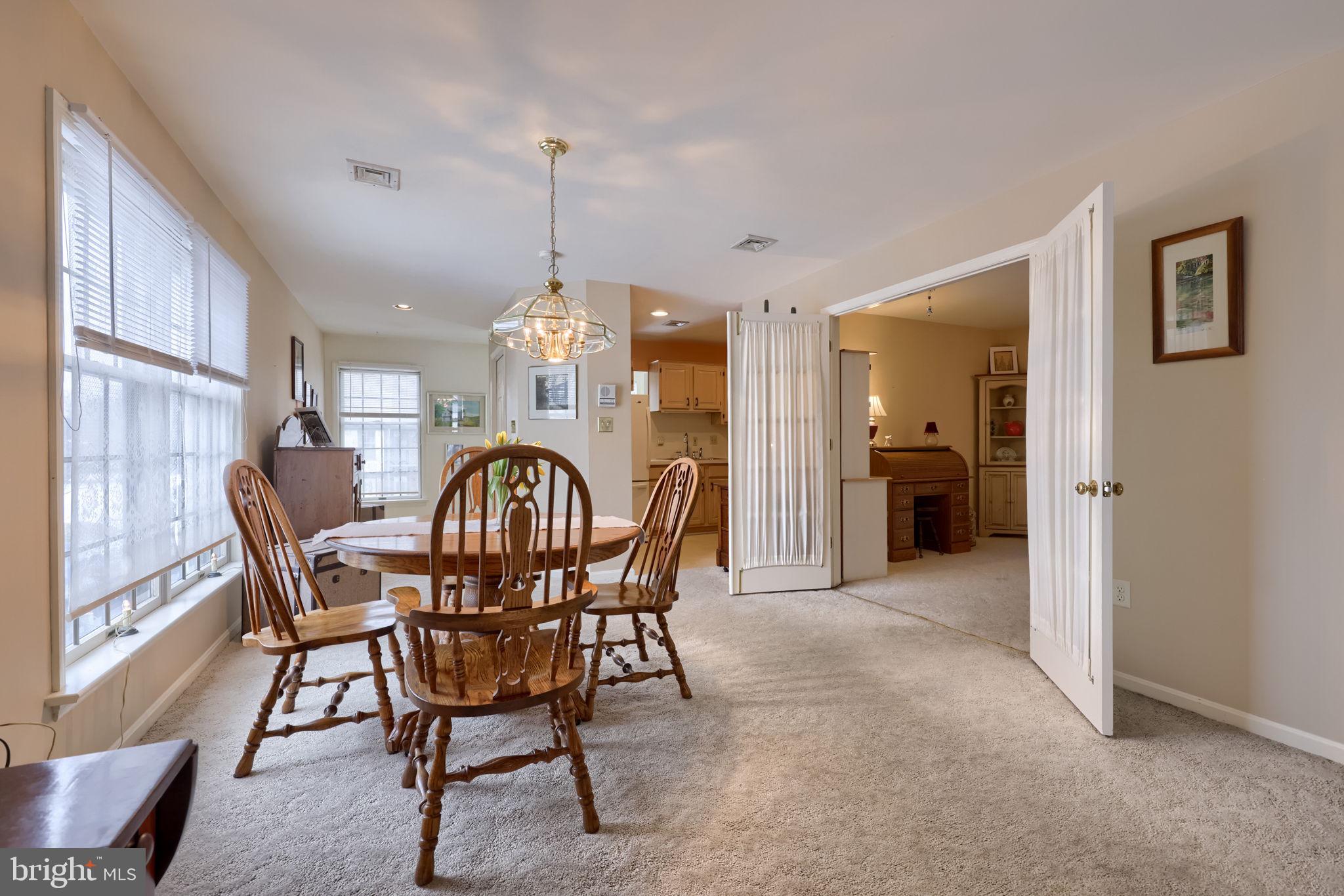 3 Amberly Way Lititz, PA 17543 - Photo 11 of 35 a view of a dining room with furniture window and wooden floor