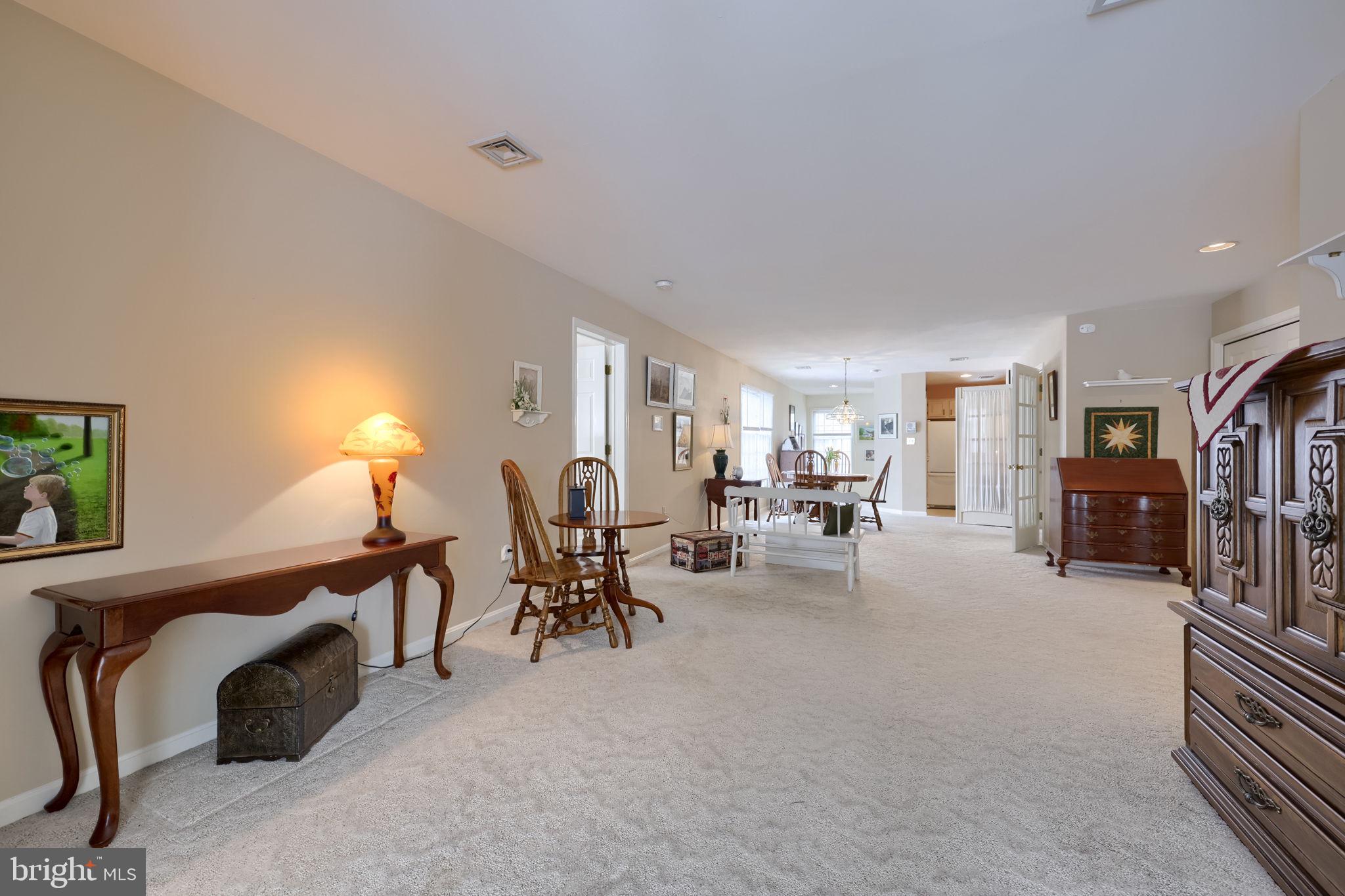 3 Amberly Way Lititz, PA 17543 - Photo 13 of 35 a bedroom with furniture and a lamp