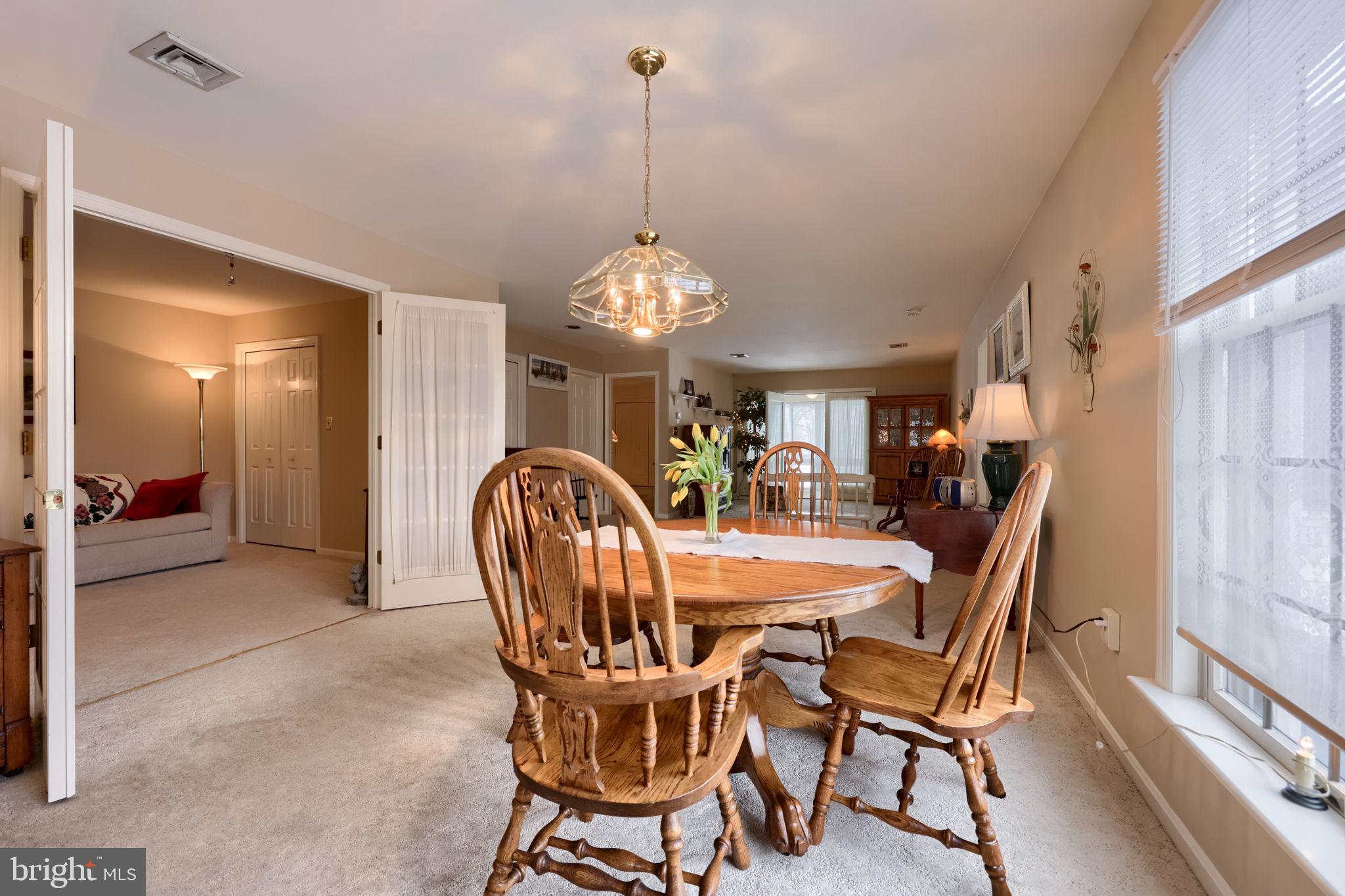 3 Amberly Way Lititz, PA 17543 - Photo 10 of 35 a view of a dining room with furniture and chandelier