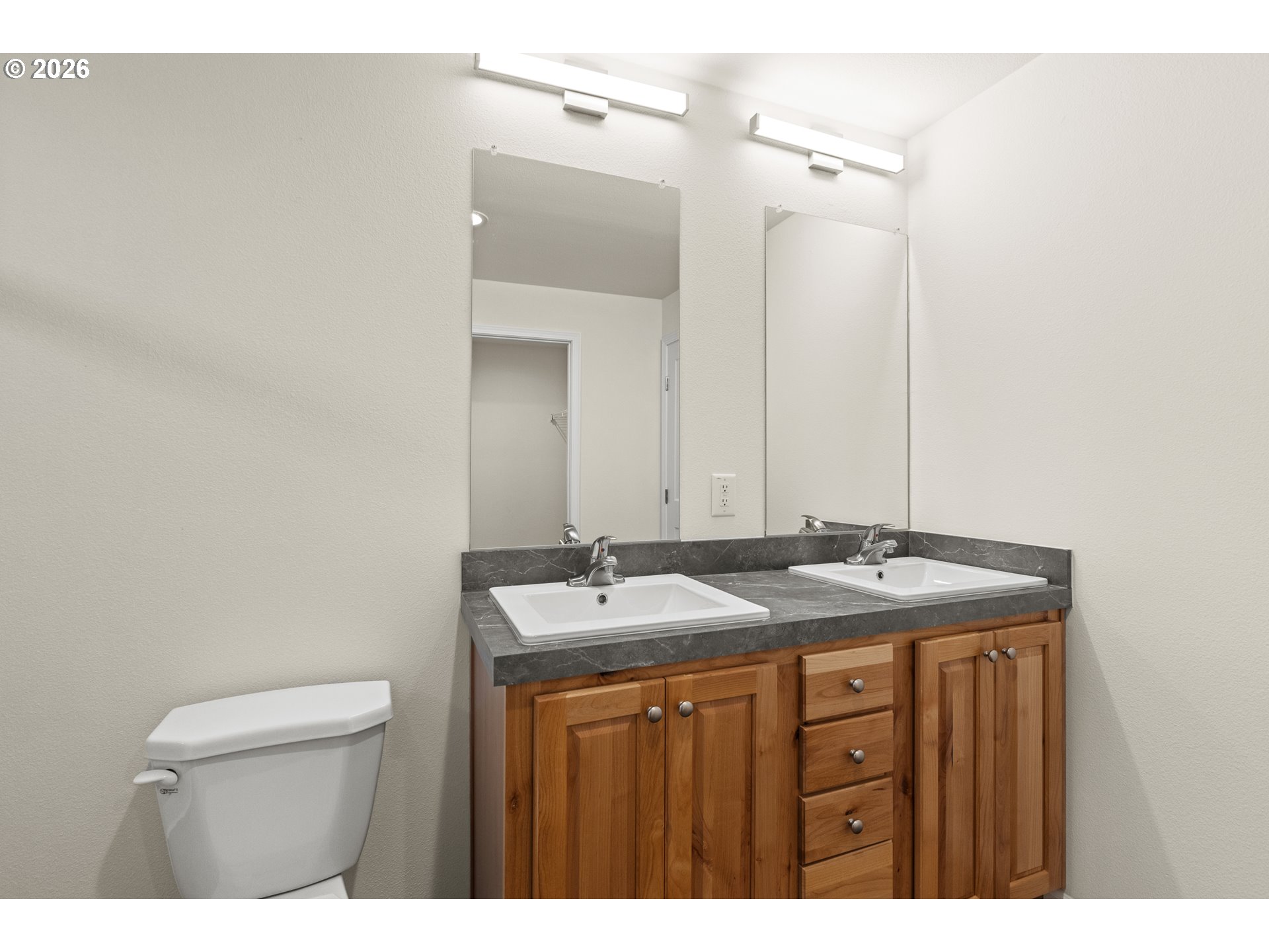 1314 Bothwick Street Myrtle Point, OR 97458 - Photo 21 of 38 a bathroom with a granite countertop sink and a mirror