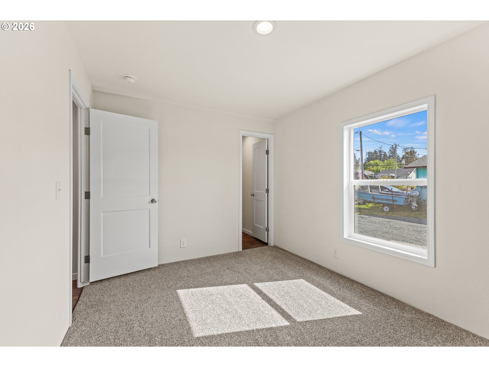 1314 Bothwick Street Myrtle Point, OR 97458 - Photo 23 of 38 a view of an empty room with a window