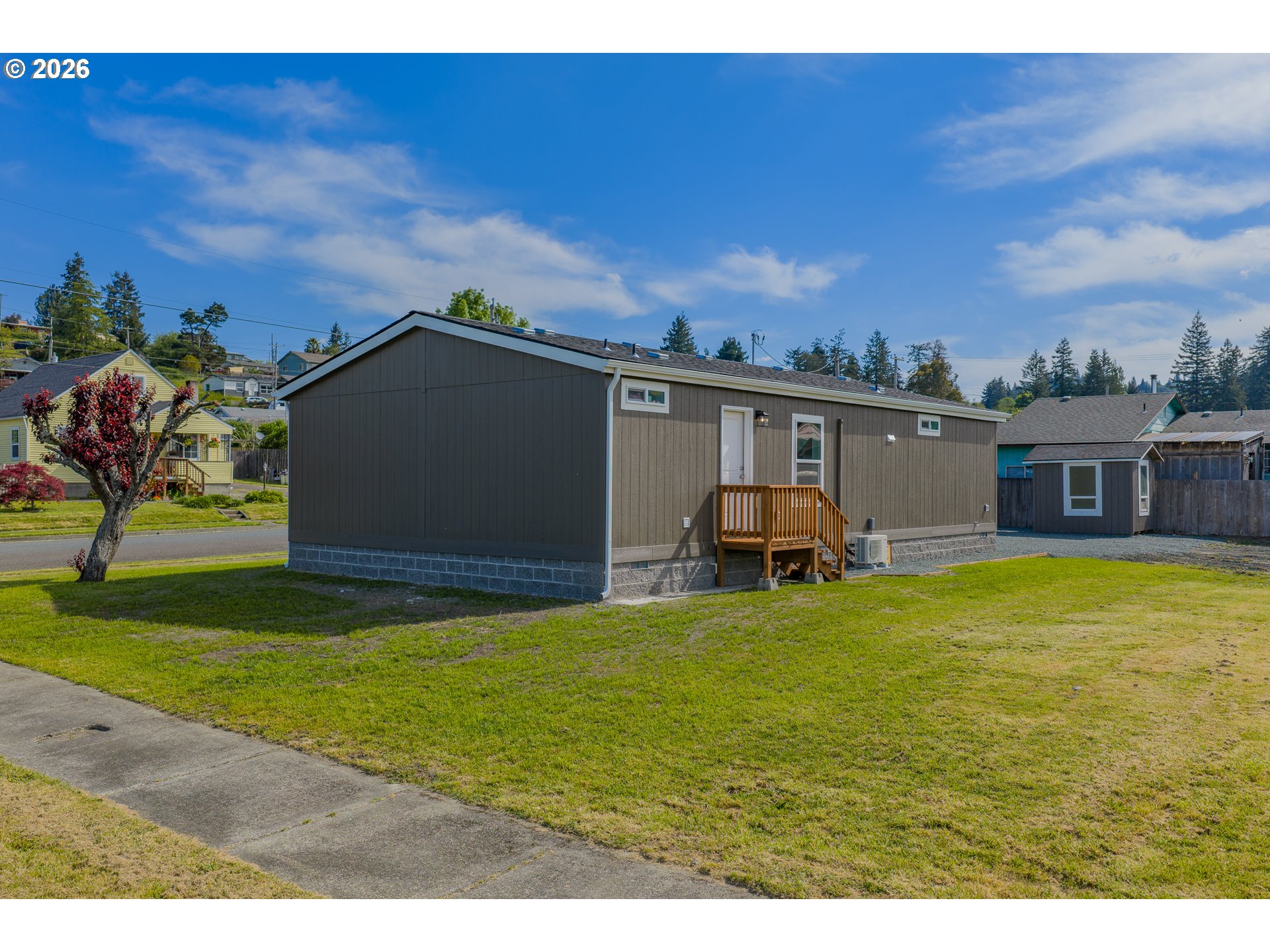 1314 Bothwick Street Myrtle Point, OR 97458 - Photo 6 of 38 a view of a swimming pool with a yard