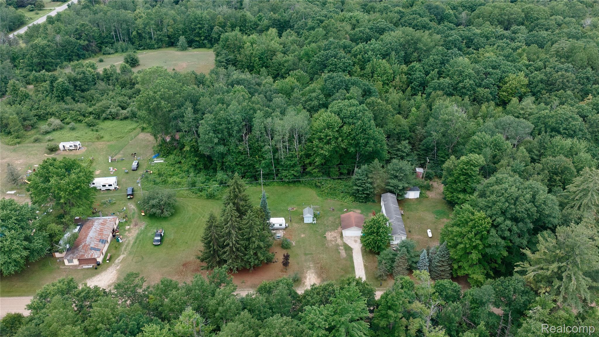 1900 Hay Road Beaverton, MI 48612 - Photo 6 of 8 dji_fly_20260702_103810_0407_1783005006189_photo.jpeg