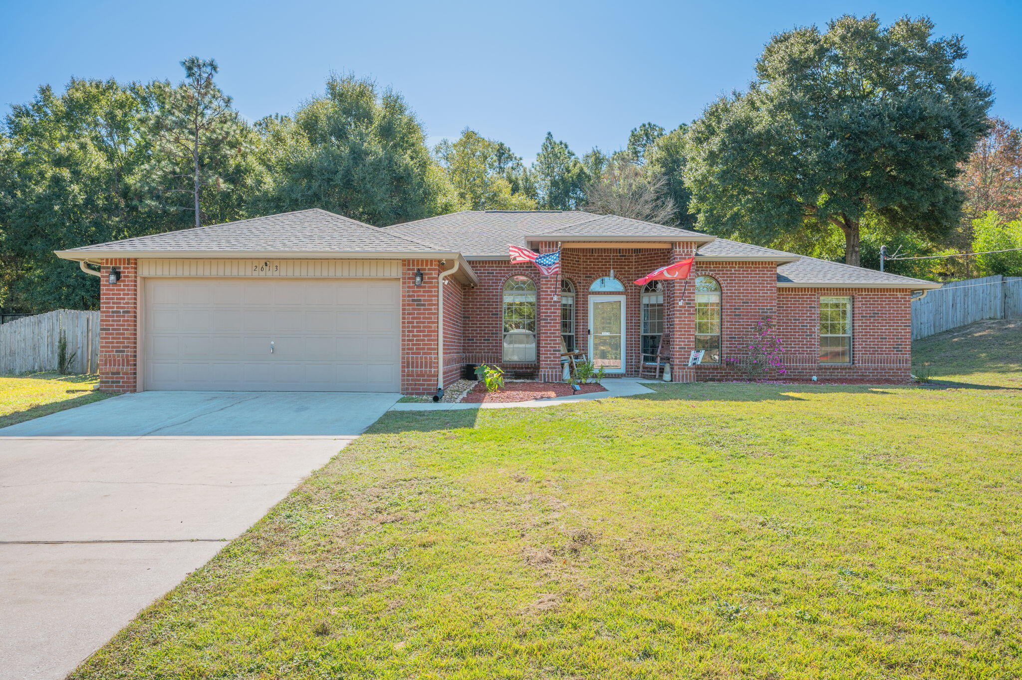2613 Corner Creek Road Crestview, FL 32536 - Photo 1 of 22 a front view of house with yard and trees