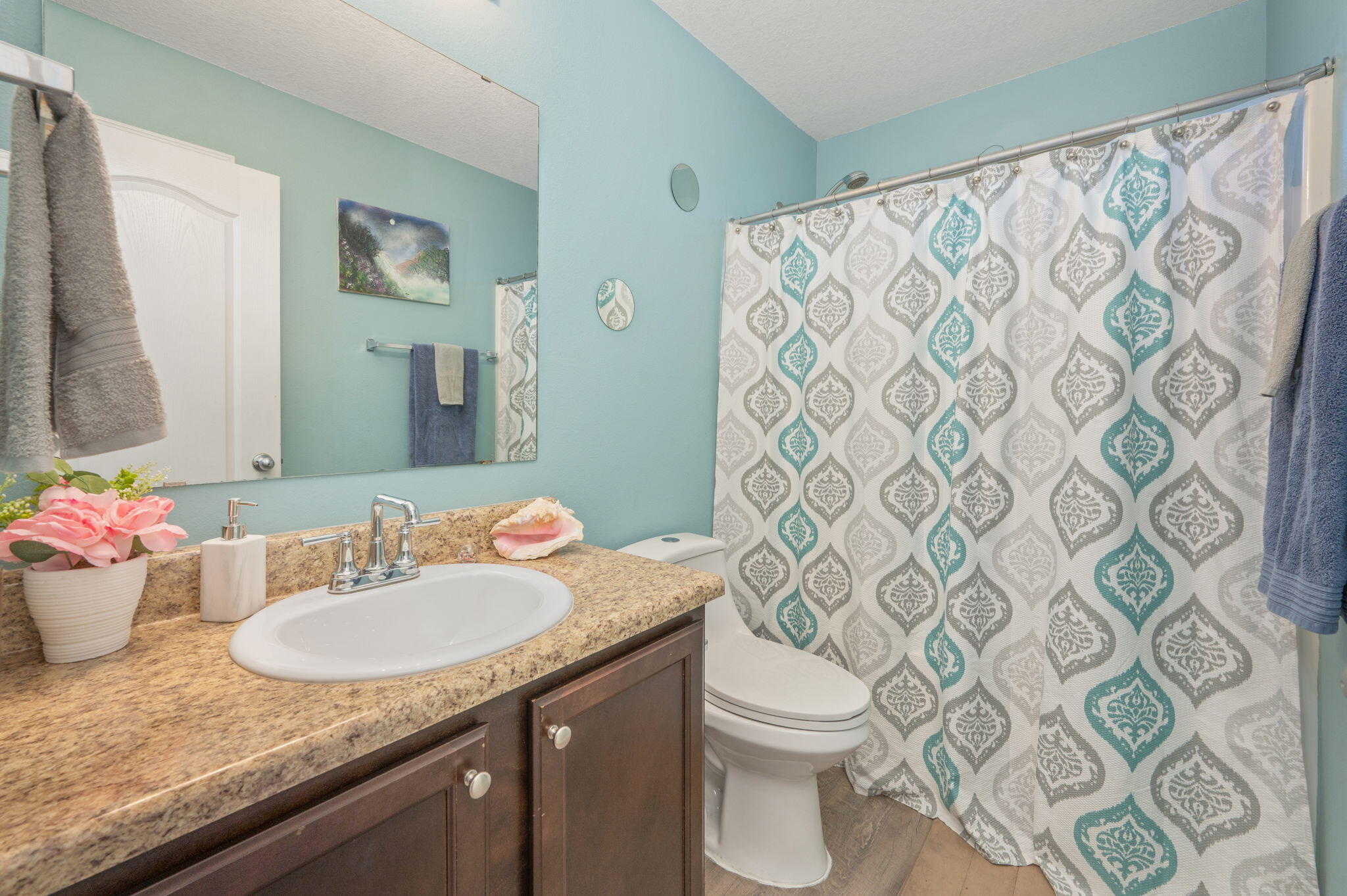 2613 Corner Creek Road Crestview, FL 32536 - Photo 14 of 22 a bathroom with a granite countertop sink and a mirror