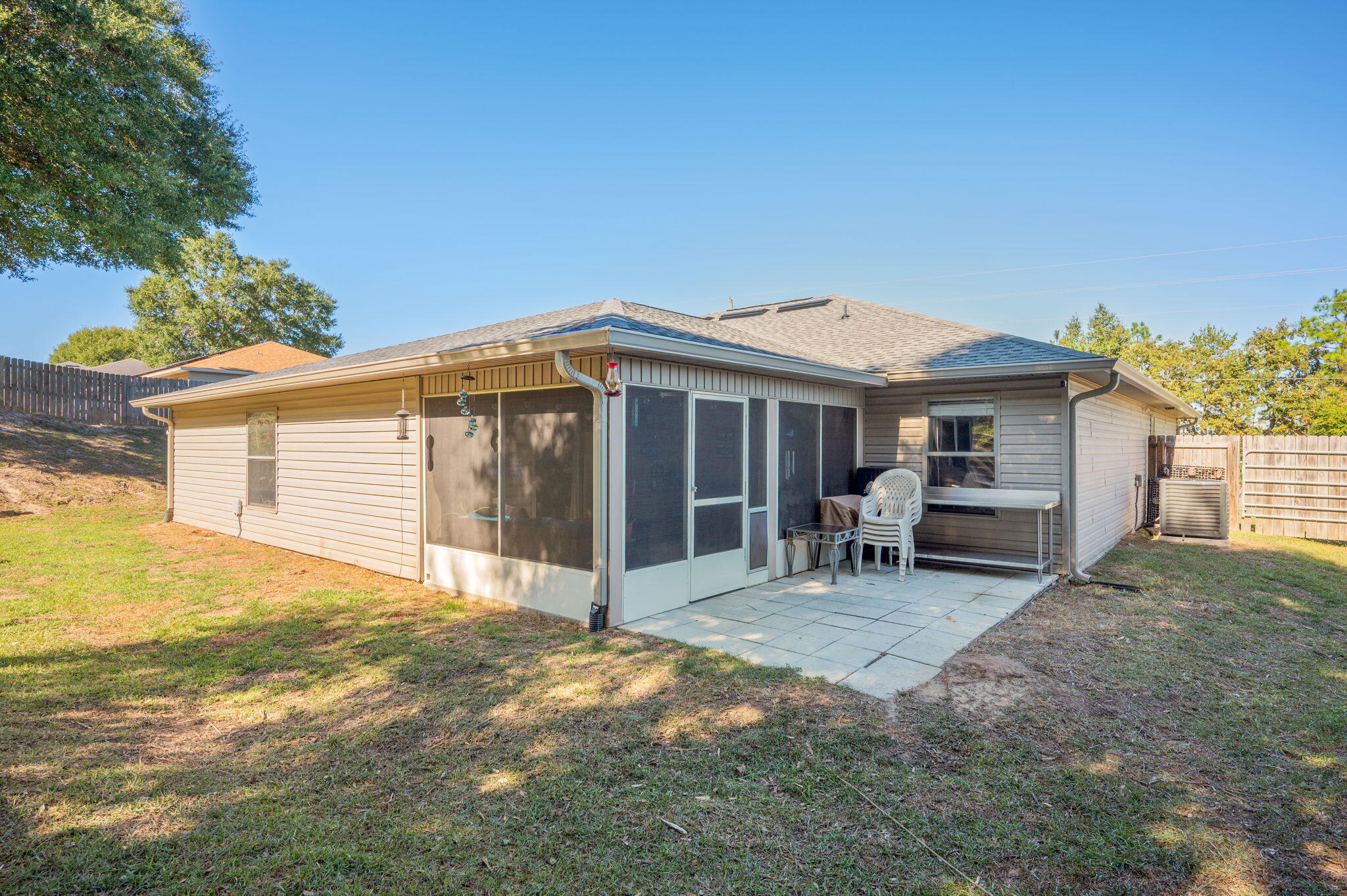 2613 Corner Creek Road Crestview, FL 32536 - Photo 22 of 22 a front view of a house with a patio