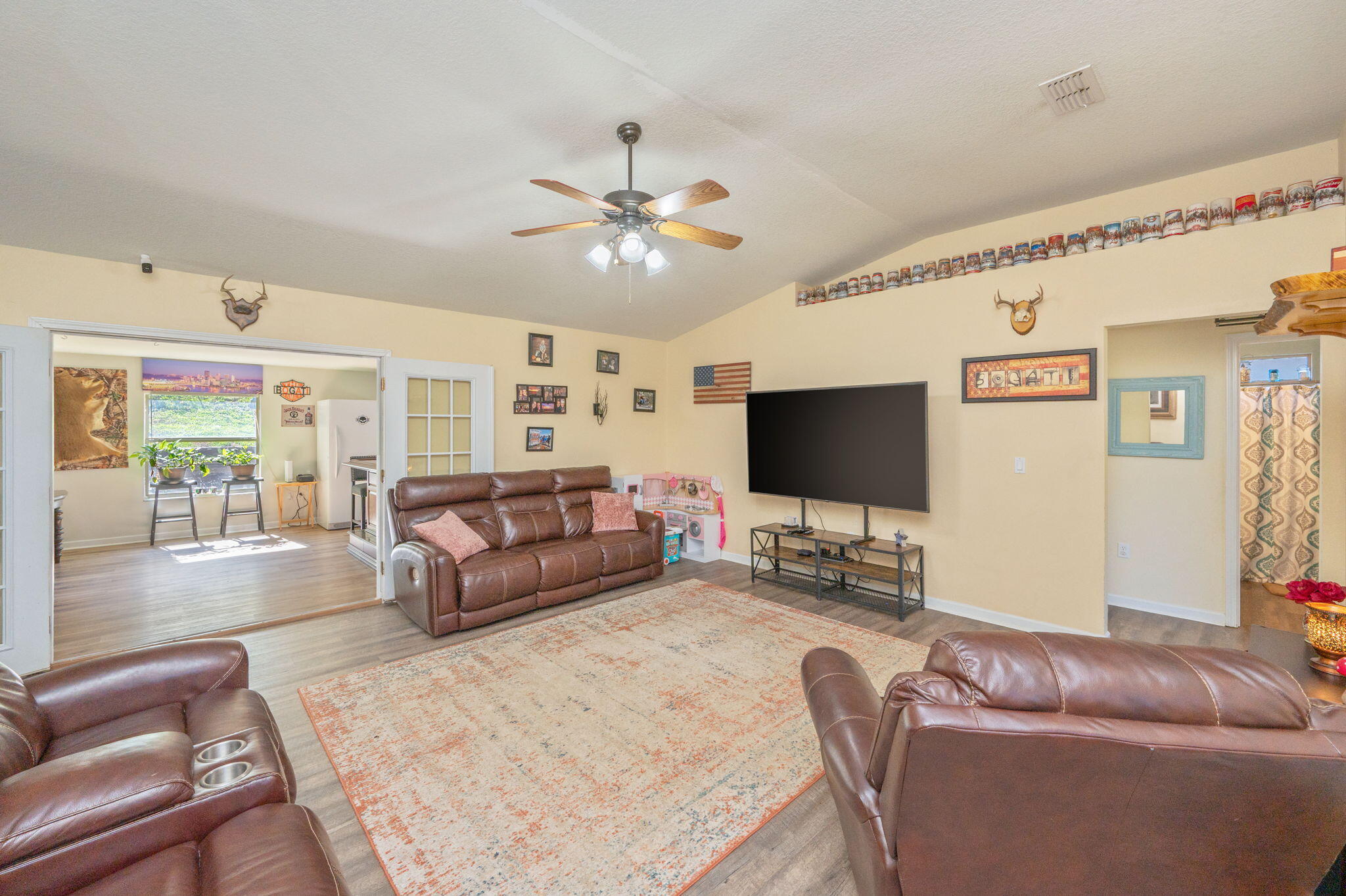 2613 Corner Creek Road Crestview, FL 32536 - Photo 3 of 22 a living room with furniture and a flat screen tv