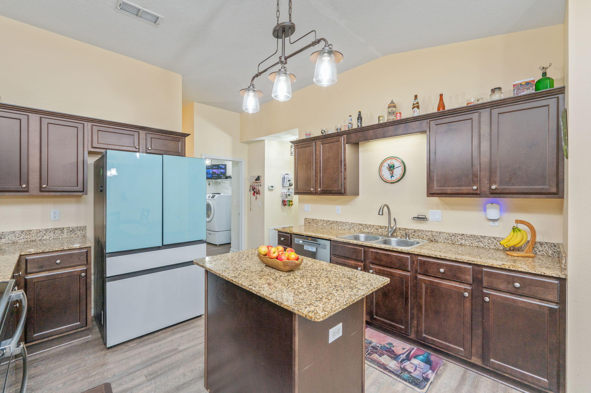 2613 Corner Creek Road Crestview, FL 32536 - Photo 5 of 22 a kitchen with stainless steel appliances granite countertop a sink stove and refrigerator