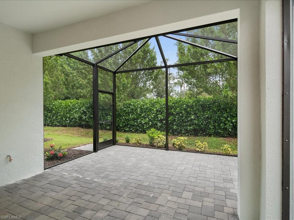 2119 Marquesa Circle Naples, FL 34112 - Photo 17 of 44 a view of a room with a large window