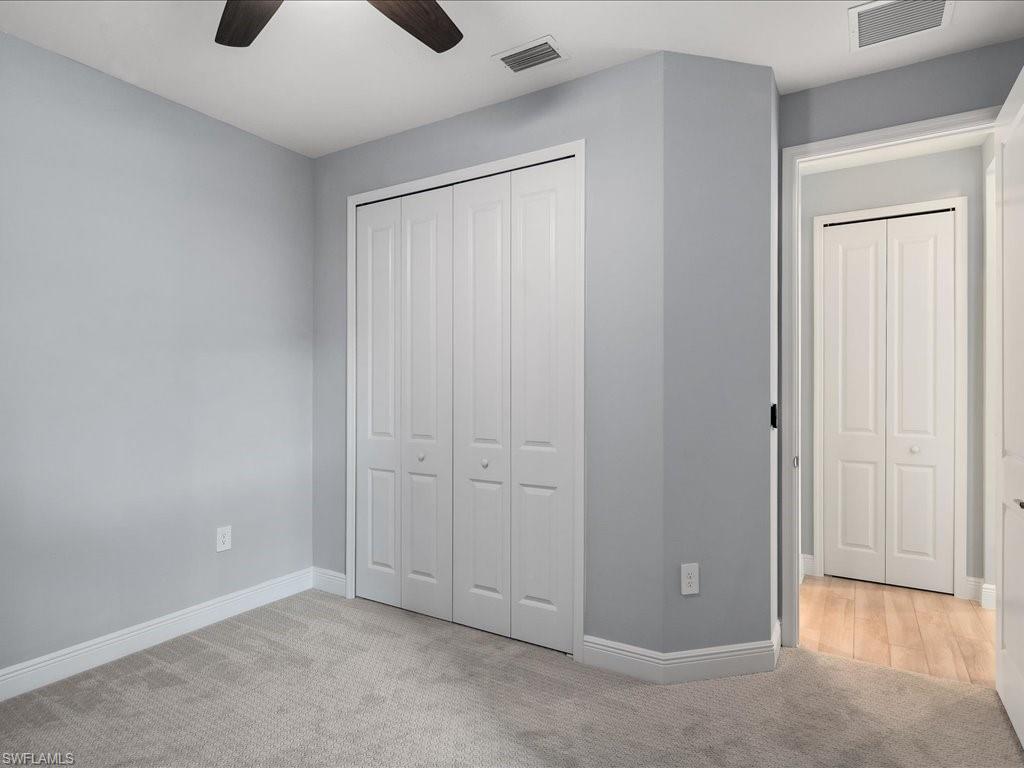 2119 Marquesa Circle Naples, FL 34112 - Photo 34 of 44 an empty room with closet area