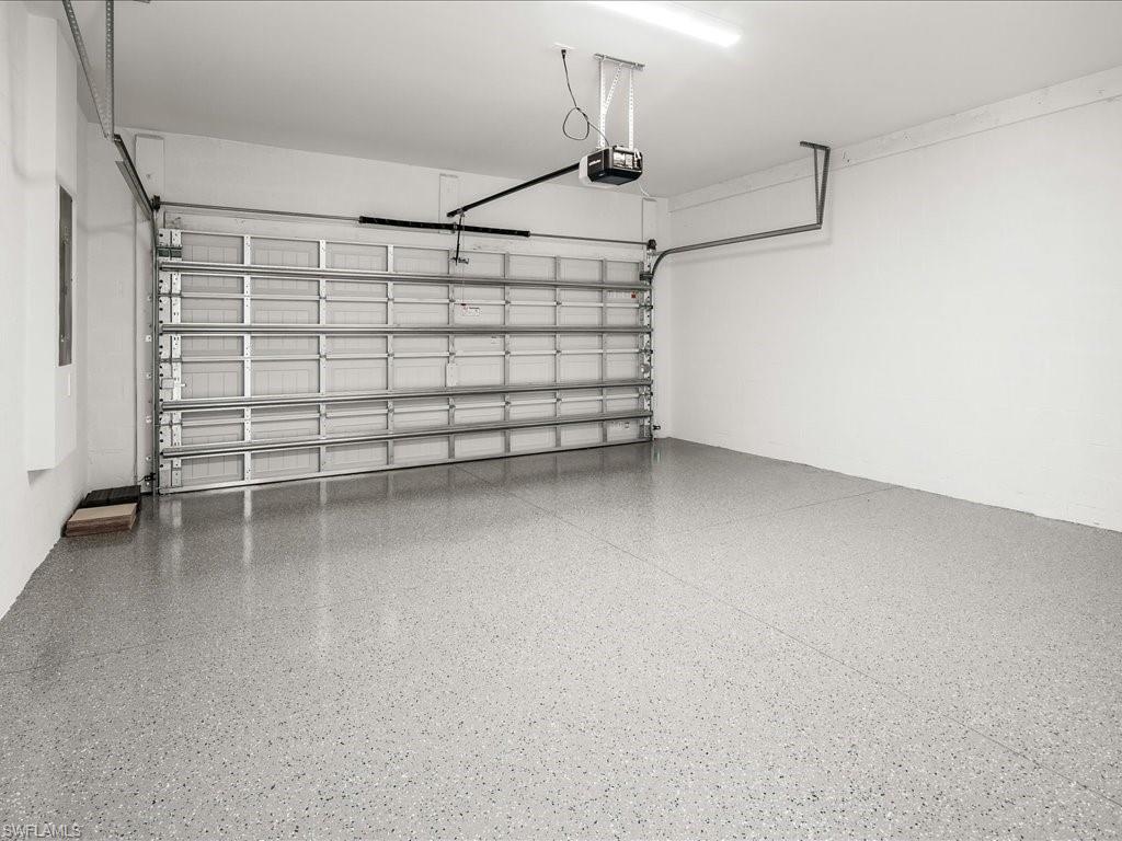 2119 Marquesa Circle Naples, FL 34112 - Photo 35 of 44 a view of a room with racks on the wall