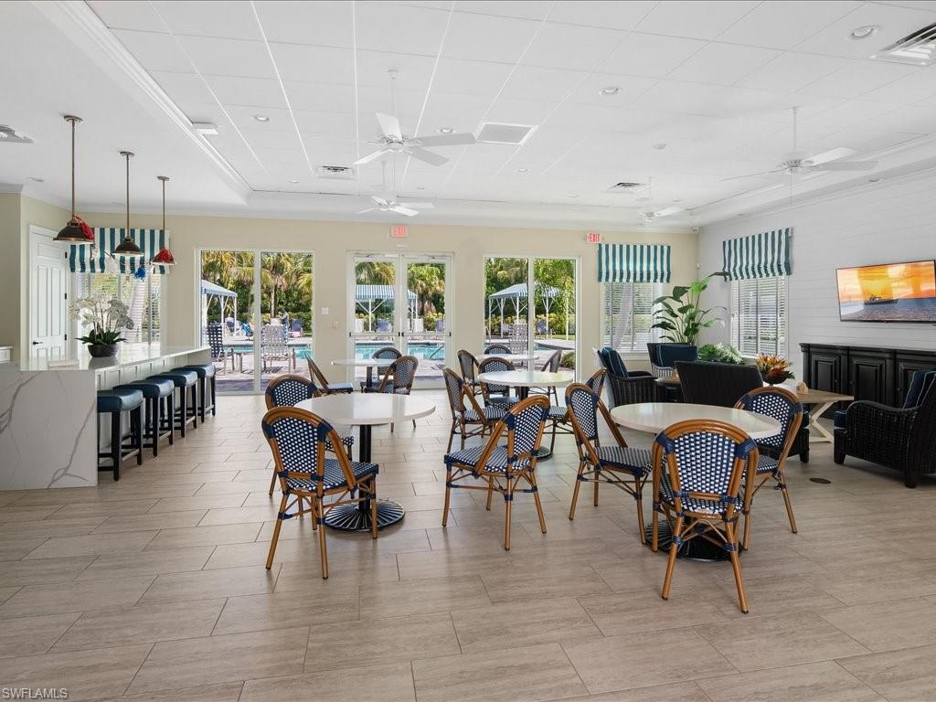2119 Marquesa Circle Naples, FL 34112 - Photo 38 of 44 a view of a dining room with furniture window and outside view