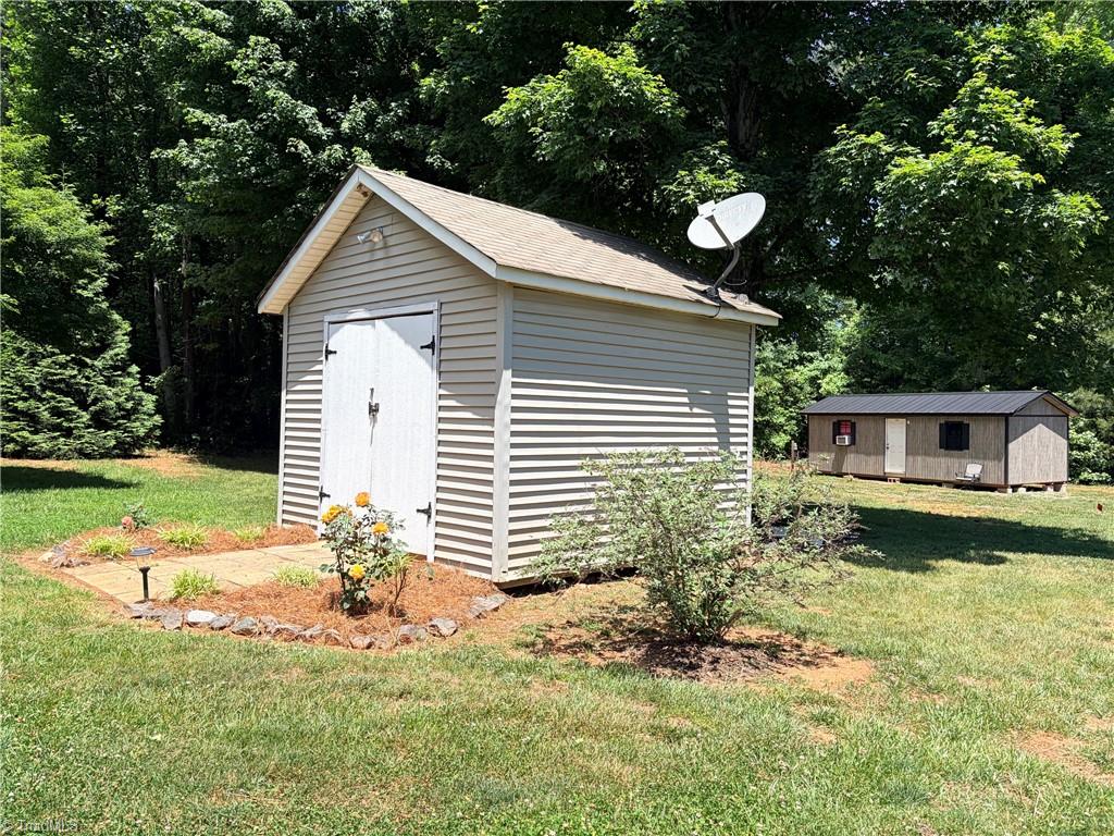 1920 Angell Road Mocksville, NC 27028 - Photo 11 of 30 shed with electric... (the dark brown shed in the background does not convey.