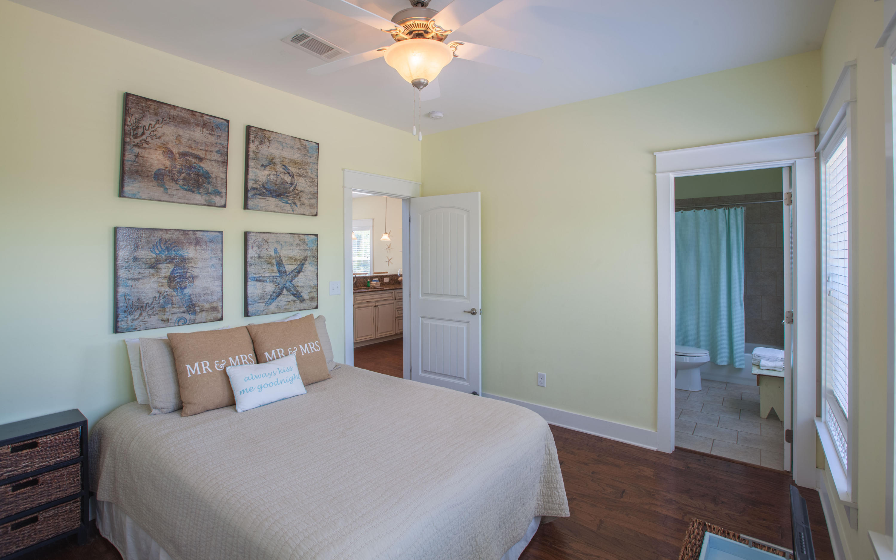 7 Windward Cove Santa Rosa Beach, FL 32459 - Photo 11 of 25 a bedroom with a large bed and a chandelier