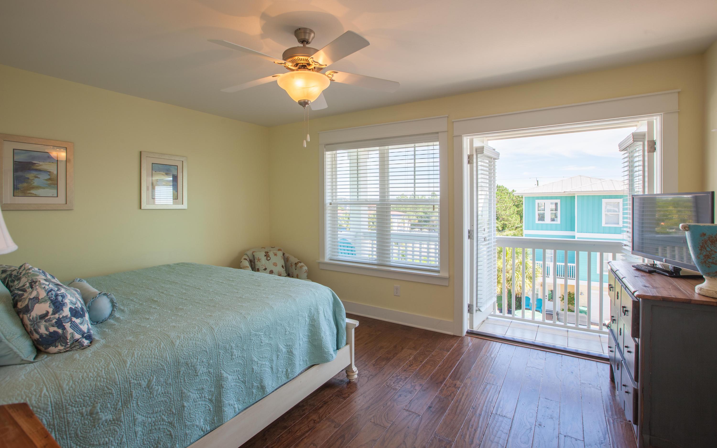 7 Windward Cove Santa Rosa Beach, FL 32459 - Photo 14 of 25 a bedroom with a bed and a large window