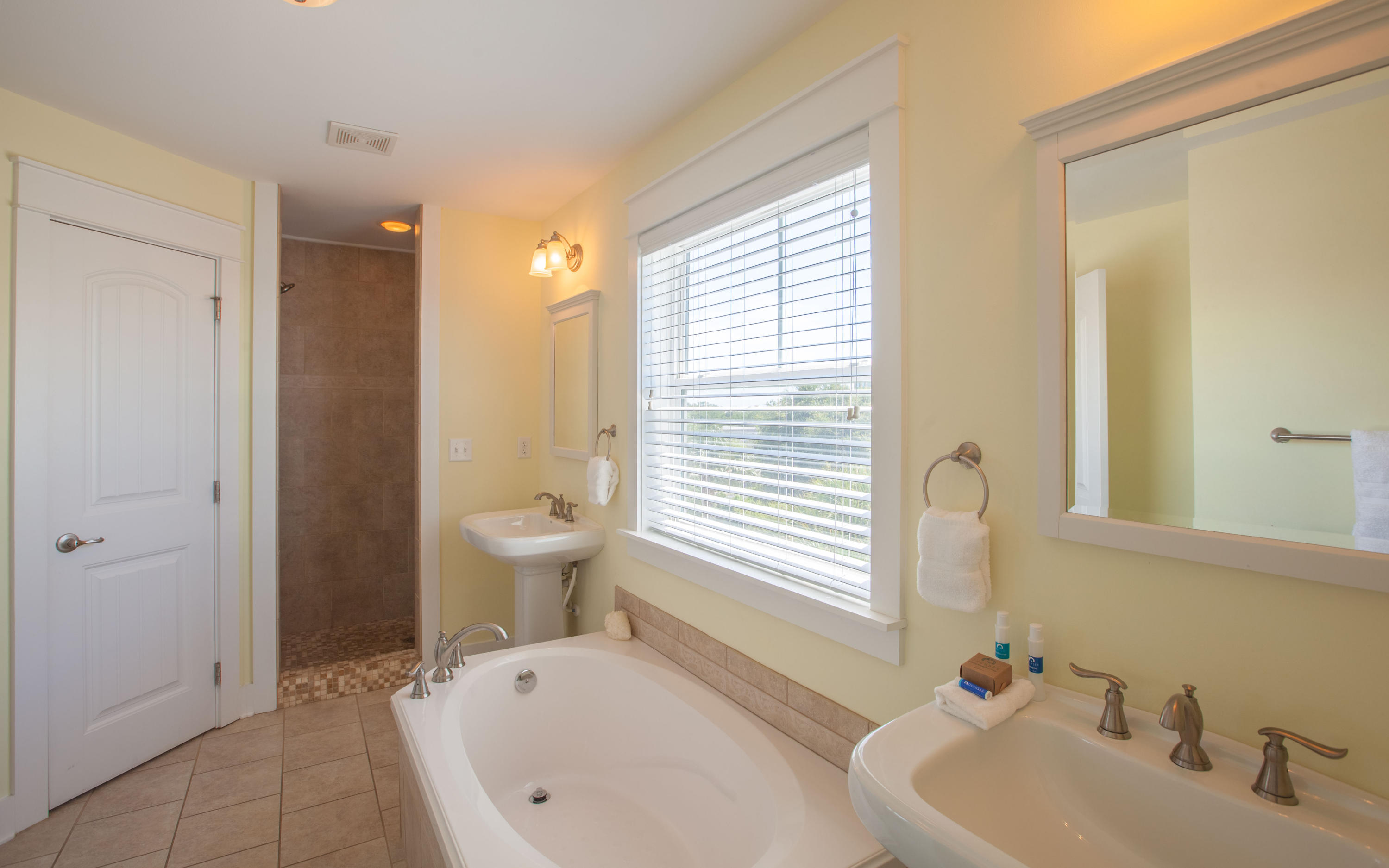 7 Windward Cove Santa Rosa Beach, FL 32459 - Photo 16 of 25 a bathroom with a sink a toilet and shower